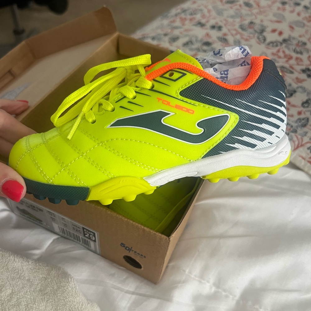 New kids soccer / turf shoes. Fun bright yellow